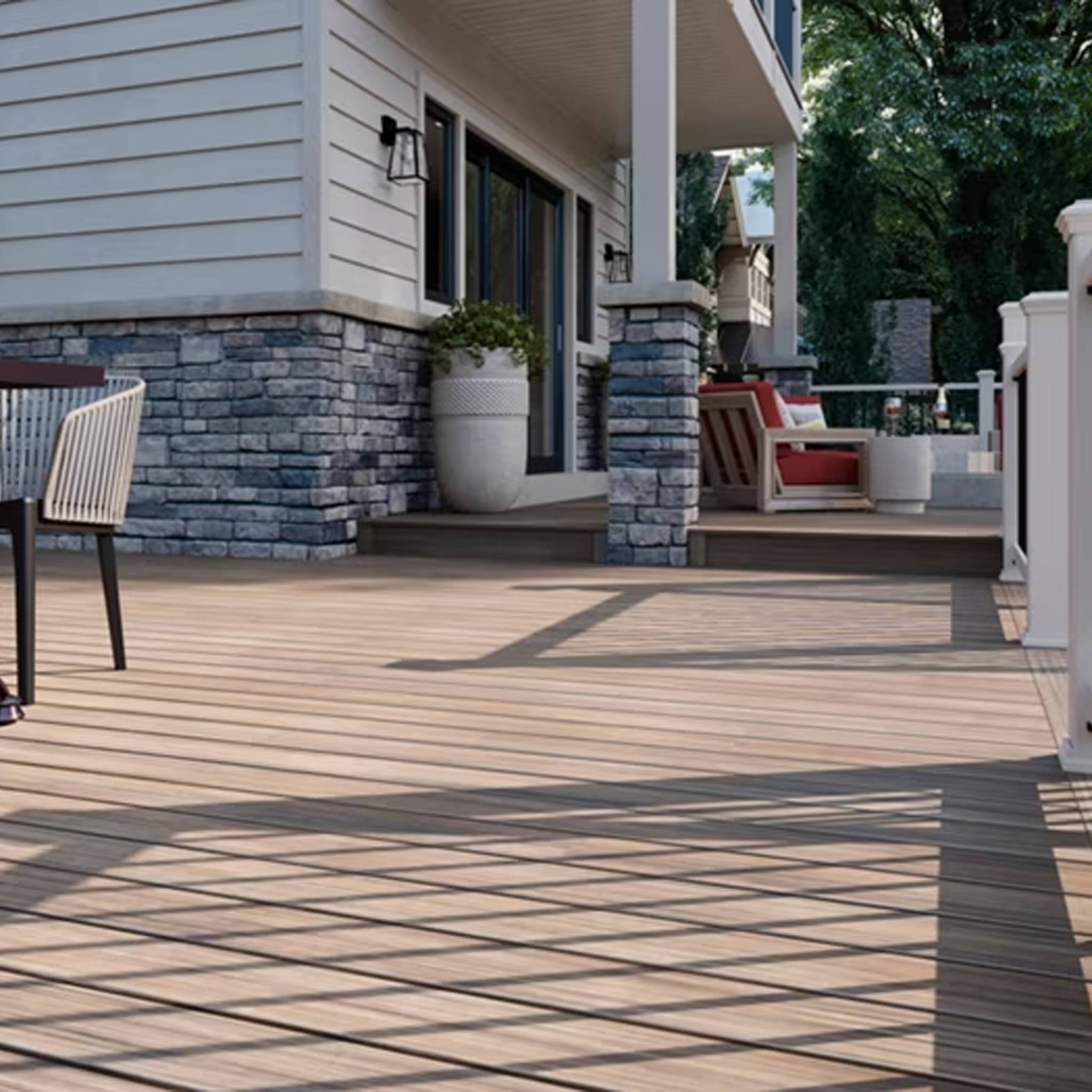 TREX Enhance Basics Honey Grove Decking Installed on a Home Patio – A beautifully designed outdoor patio featuring TREX Enhance Basics Honey Grove decking, blending seamlessly with modern and rustic architecture.