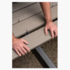 Composite deck boards being installed using CAMO Wedge Metal Clips on a metal framing system.