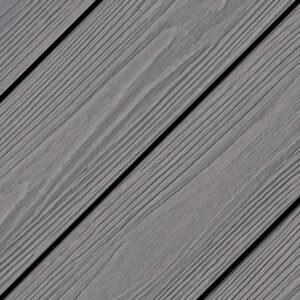 Close-up of EVA-LAST APEX Plus Alaskan Driftwood decking board showcasing natural woodgrain texture in soft grey tones